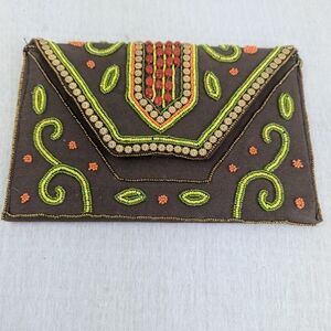 Vibrant Beaded Clutch with Embroidered Swirls